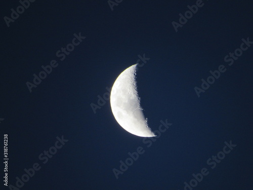 A moon in a blue night