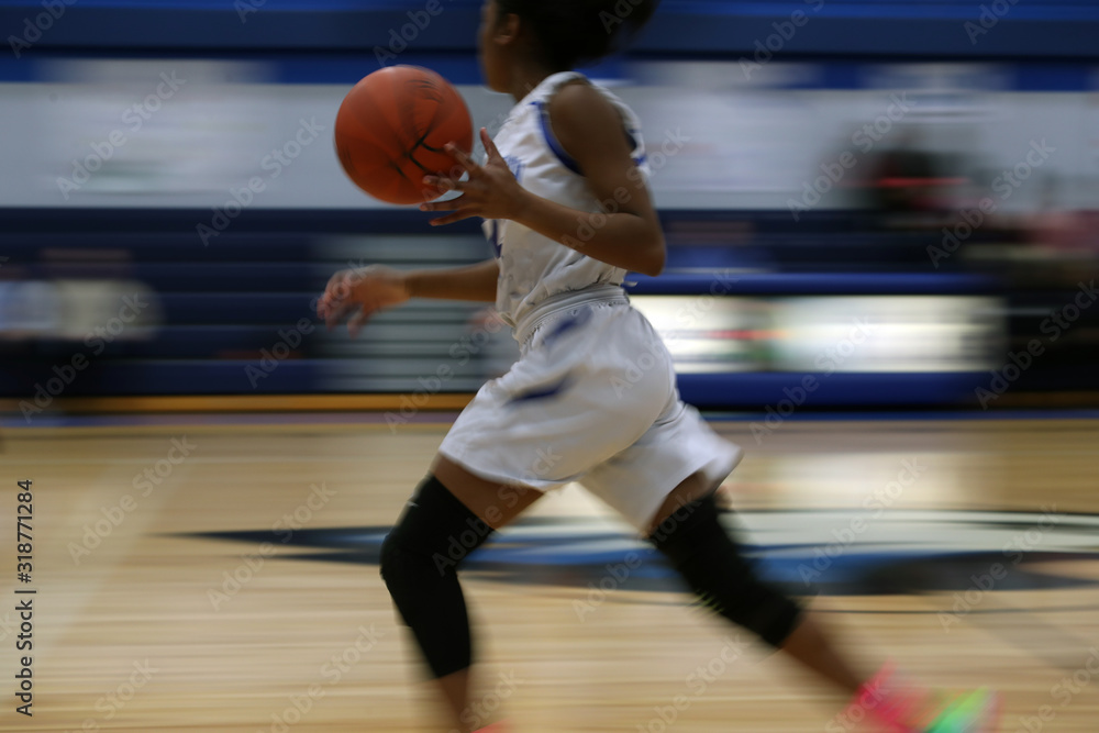 fast break during a girls high school basketball game