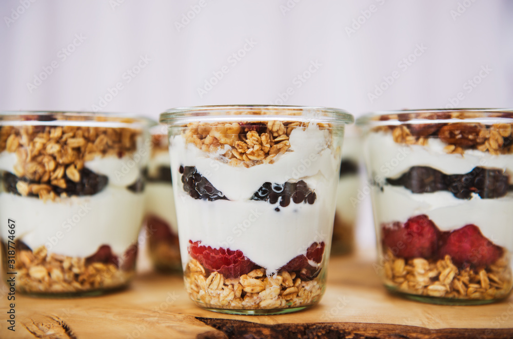 Servings of yogurt with fruit and granola Servings of yogurt with fruit and granola