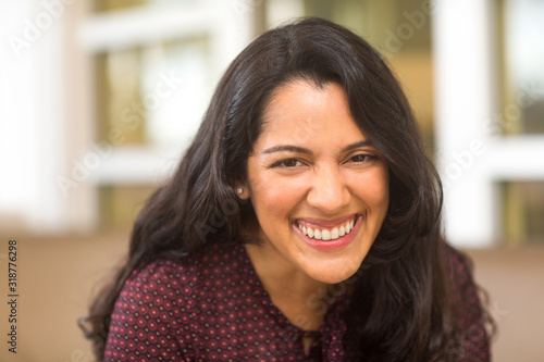 Confident Hispanic woman laughing and smiling stock photo © digitalskillet1