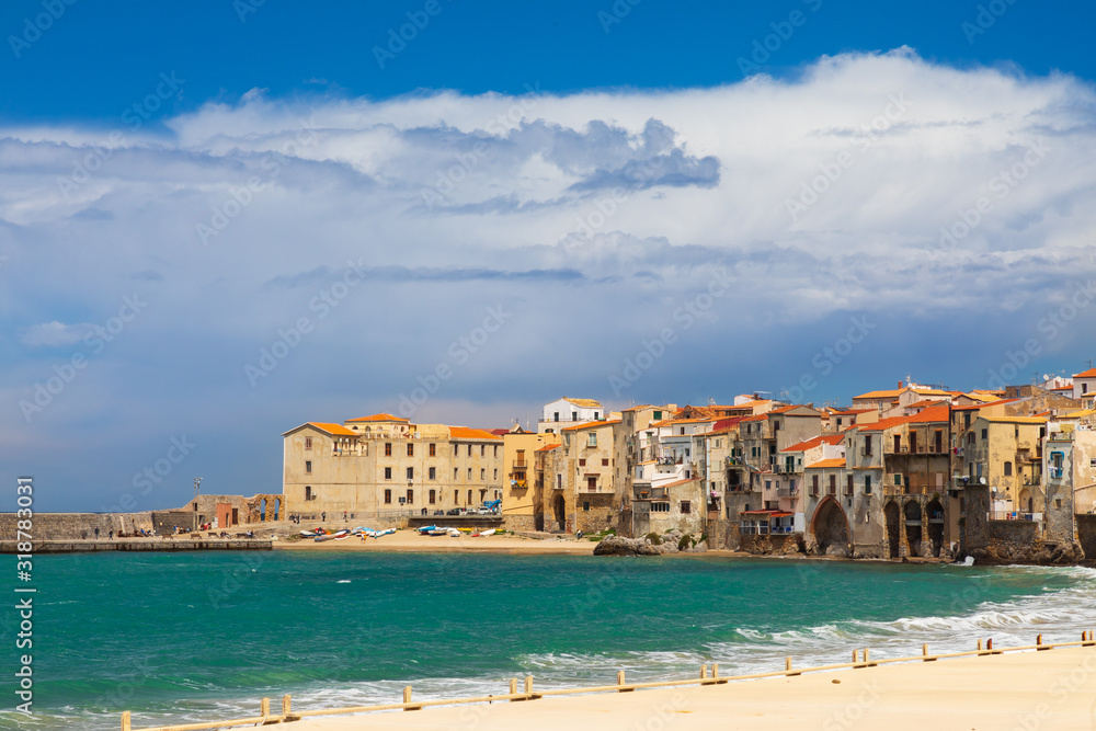 Italy, Sicily, Palermo Province, Cefalu. The beach on the Mediterranean Sea, in the Sicilian town of Cefalu.
