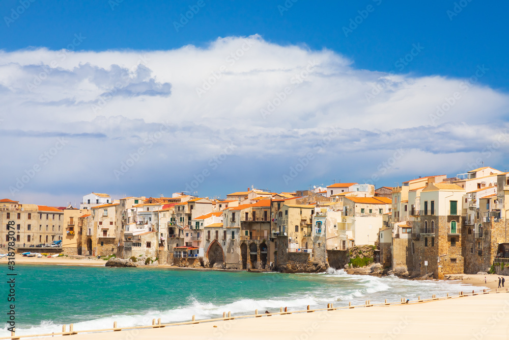 Italy, Sicily, Palermo Province, Cefalu.  The beach on the Mediterranean Sea in the town of Cefalu.