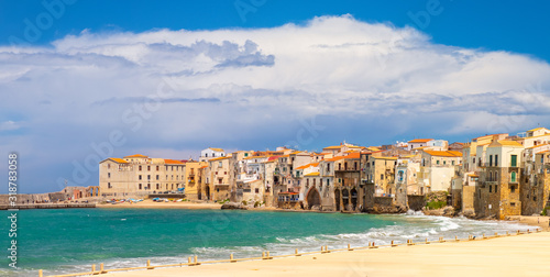 Fototapeta Naklejka Na Ścianę i Meble -  Italy, Sicily, Palermo Province, Cefalu. The beach on the Mediterranean Sea in the town of Cefalu.