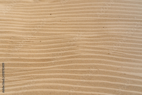 Textured yellow sand on the beach