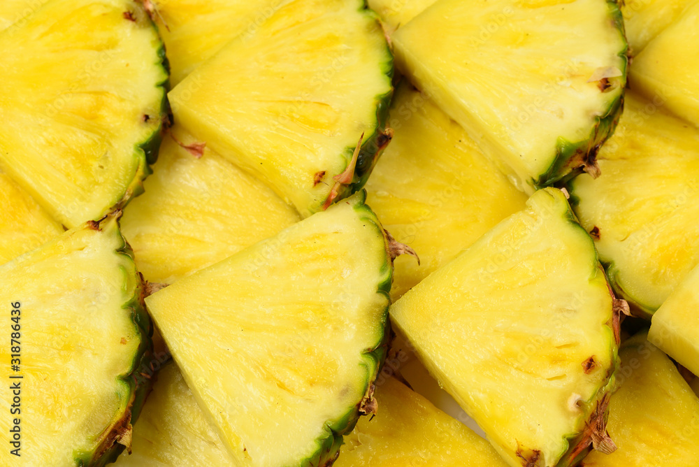 Pineapple juicy yellow slices background. Top view. Pineapple juicy yellow slices background. Top view.