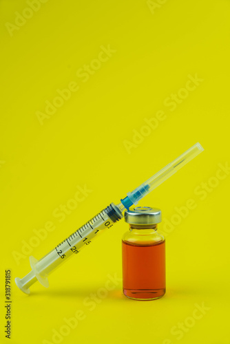  Medicine bottle for injection. Medical glass vials and syringe for vaccination. Liquid red drug or vaccine for treatment, flu in laboratory, hospital, healthcare, or pharmacy concept, isolated