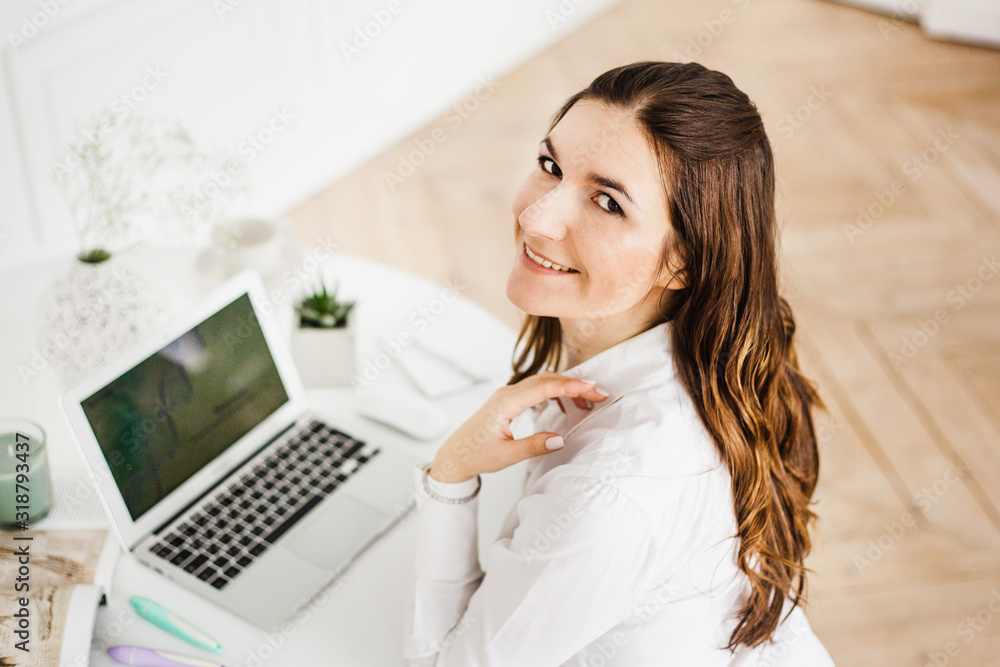 Woman working at a computer, freelancer or Manager, self-employed, business Woman working at a computer, freelancer or Manager, self-employed, business