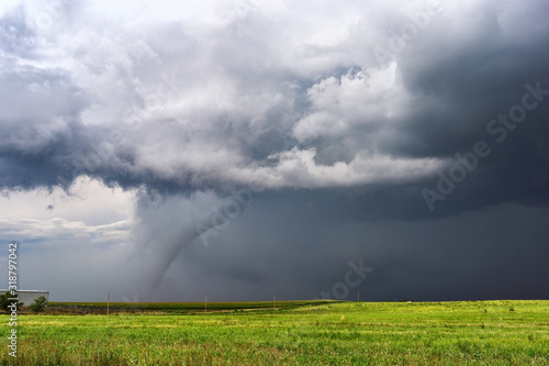 Tornado with dark storm clouds © JSirlin