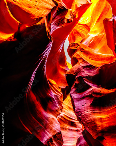 The smooth curved Red Navajo Sandstone walls of the Upper Antelope Canyon, one of the famous Slot Canyons in the Navajo lands near Page Arizona, United States
