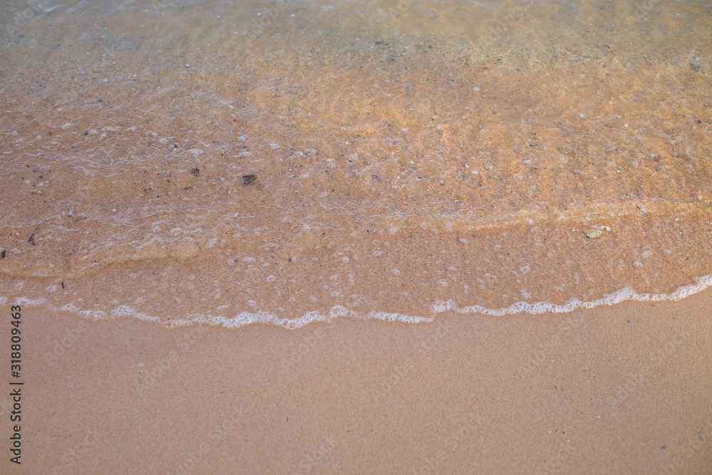 Sea wave on the sand beach Sea wave on the sand beach