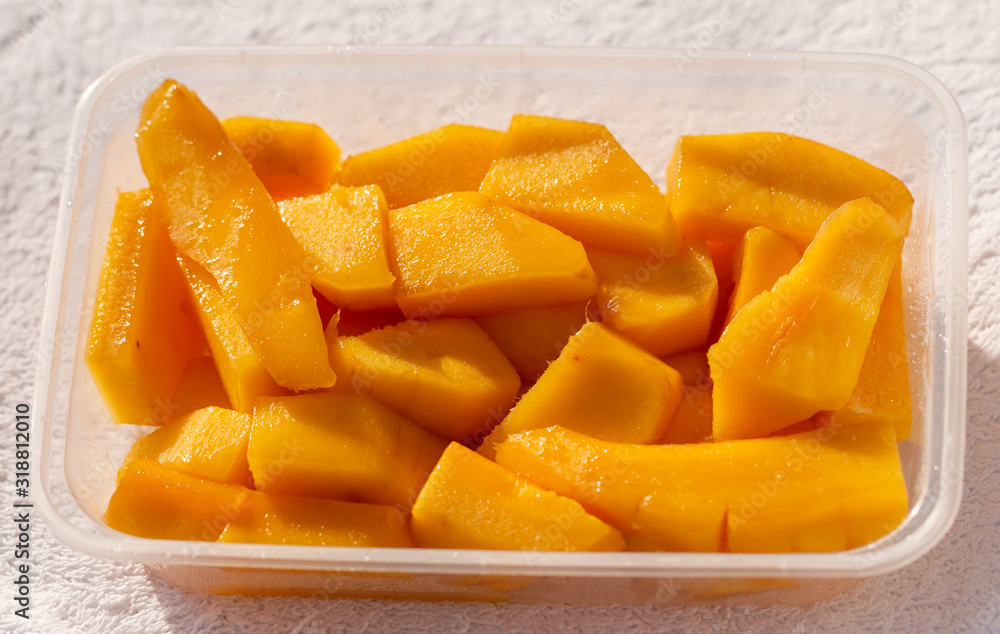 slices of ripe mango as background slices of ripe mango as background