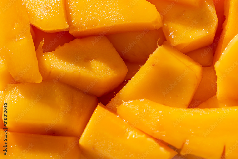 slices of ripe mango as background slices of ripe mango as background