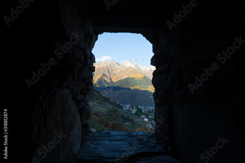 View through a small window of an ancient house in Ushguli village in Svaneti. Georgia