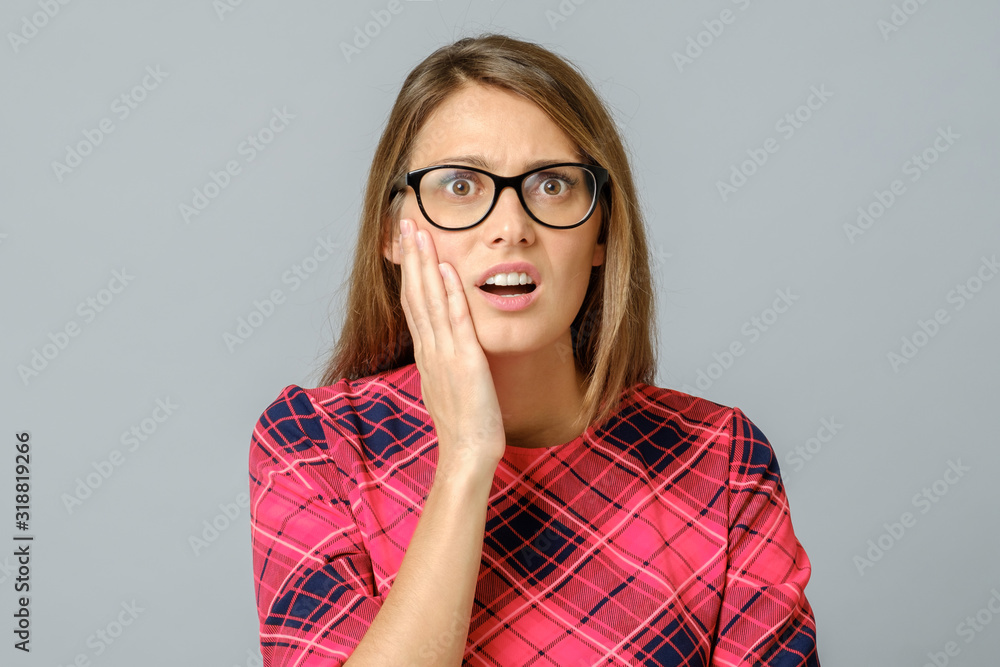 Impressed speechless pretty caucasian female woman astonished Impressed speechless pretty caucasian female woman astonished