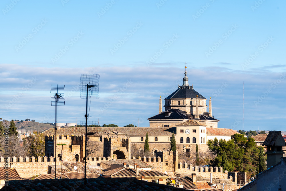 Cityscape of Toledo from the ramparts with Hospital Tavera a famous building of Renaissance style