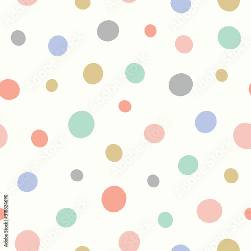 Dot pattern in pastel colours. Fun textured spotted vector seamless repeat background design.