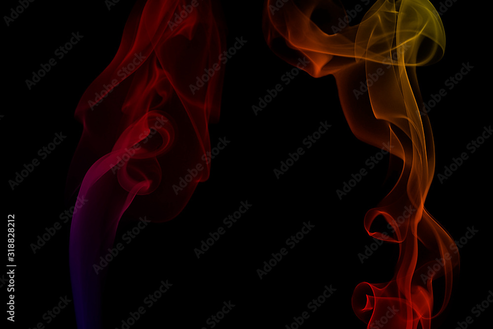 A black background with two flames of fire A black background with two flames of fire
