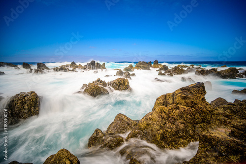 Porto Moniz - Long exposure of rocks and waves at vulcanic coast - beautiful landscape scenery of Madeira Island, Portugal