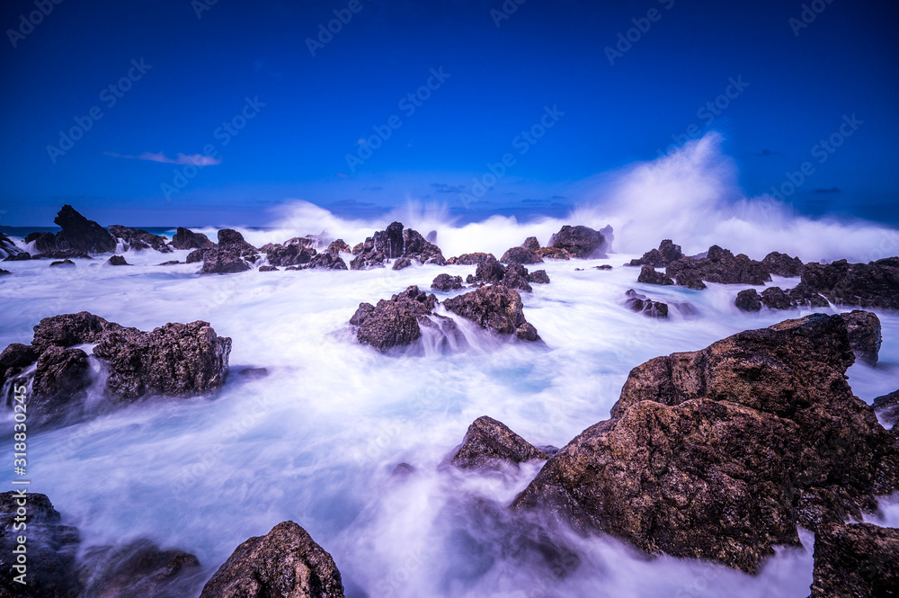 Porto Moniz - Long exposure of rocks and waves at vulcanic coast - beautiful landscape scenery of Madeira Island, Portugal