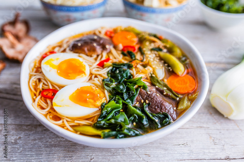 Ramen soup with noodles and traditional ingredients.