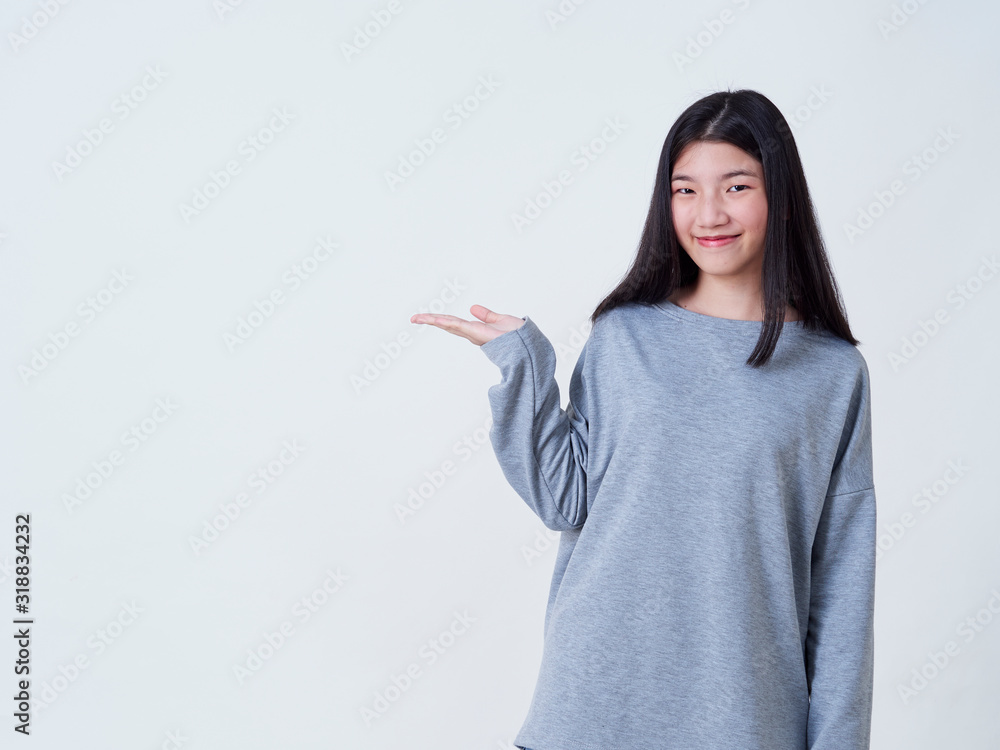 Teenage girl pointing copy space. Teenage girl pointing copy space.