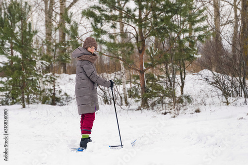 skiing girl in the forest © Mikhail Ulyannikov