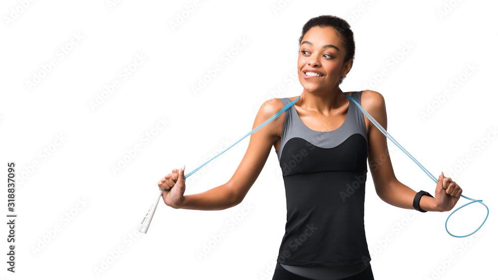 Fitness Lady Holding Jump Rope Posing Over White Background, Panorama Fitness Lady Holding Jump Rope Posing Over White Background, Panorama