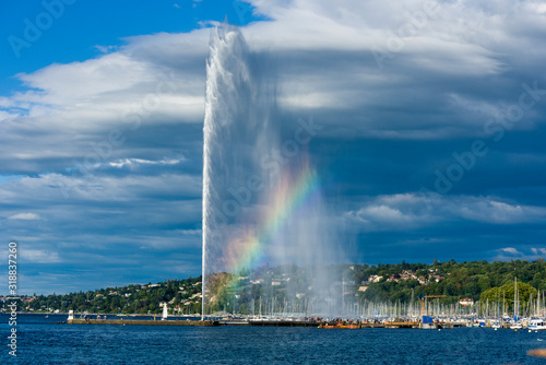Beautiful view of the water jet fountain with rainbow in the lake of Geneva, Switzerland