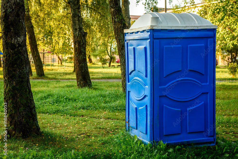 A portable toilet at a construction site. A portable toilet at a construction site.