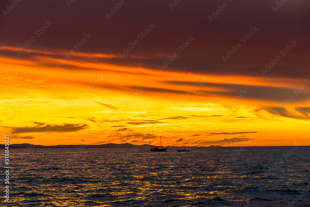 Dramatic sky with sunset over the sea, landscape from the beach in Zadar, Dalmatia, Croatia, Europe