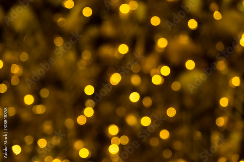 Lighting bulb and decorative golden pine tree Merry Christmas and Happy New Year for abstract background texture  Selective focus