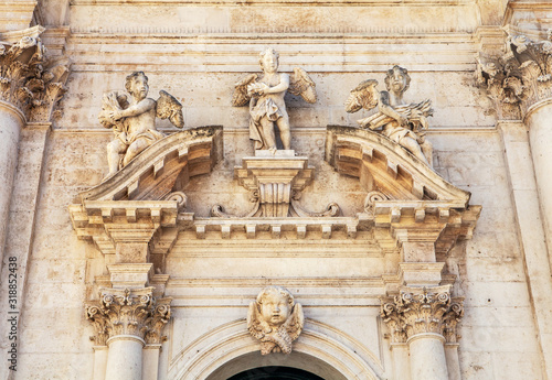 detail of sculpture above the door of entrance into the Church, the fortress Croatia