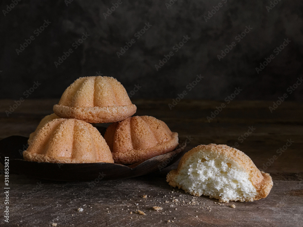 Dark photoshoot baulu cakes. A malay called kuih bahulu. Stock Photo ...