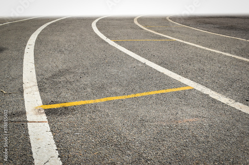 black tarmac asphalt of running track, athletic sport background © sutichak