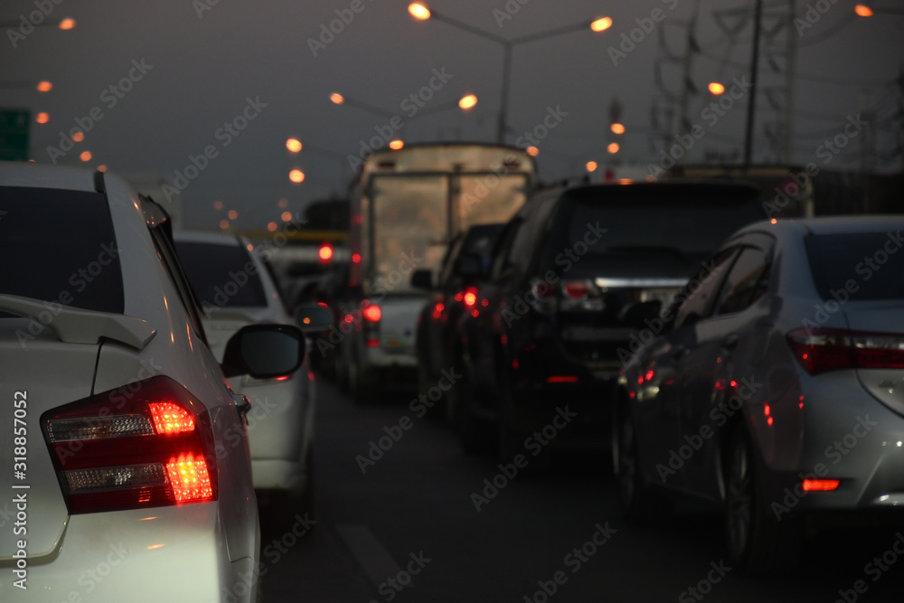 traffic jam on night road, car driving in rush hour of city life