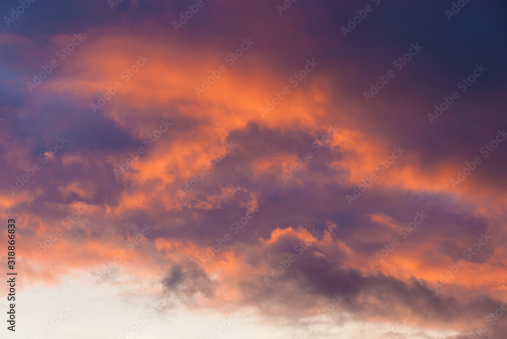Winter sunset sky and clouds with beautiful colors as background