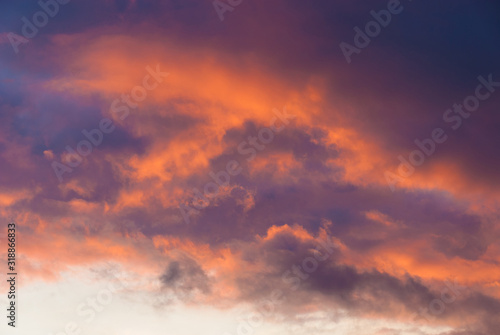 Winter sunset sky and clouds with beautiful colors as background