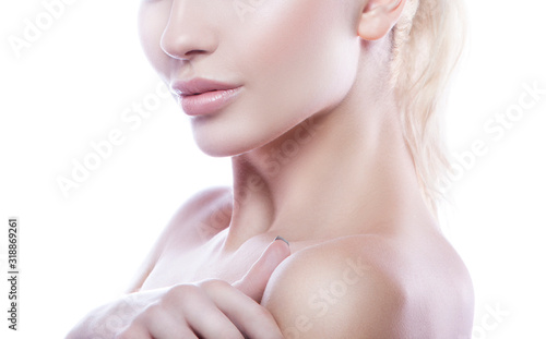 Lips, shoulder. Partial beauty face of young woman with perfect skin