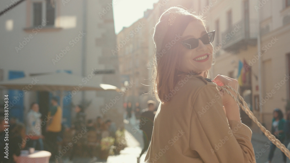 Happy portrait young attractive smile woman look around at city center fashion girl face in city center woman adult cute lifestyle style street outdoor slow motion Happy portrait young attractive smile woman look around at city center fashion girl face in city center woman adult cute lifestyle style street outdoor slow motion