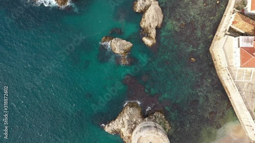 Vista cenital de rocas y Mar Adriatico photo