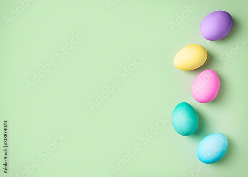 Easter colorful flat lay with eggs row