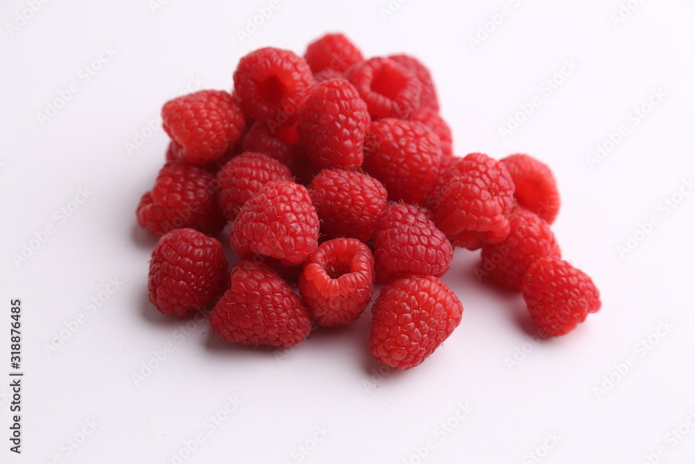 delicious raspberries in colorful background delicious raspberries in colorful background