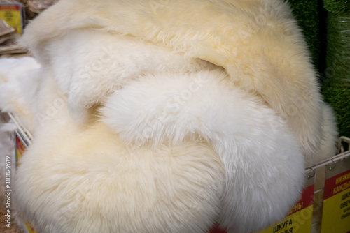 Pile of Animal skins with white fur