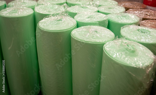 Rolls of foam underlayment for the Laminate Flooring in a shop photo