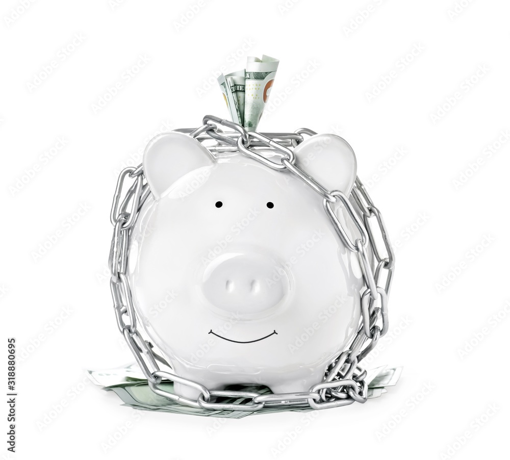 Piggy bank with steel chain isolated on white. Money safety concept Piggy bank with steel chain isolated on white. Money safety concept