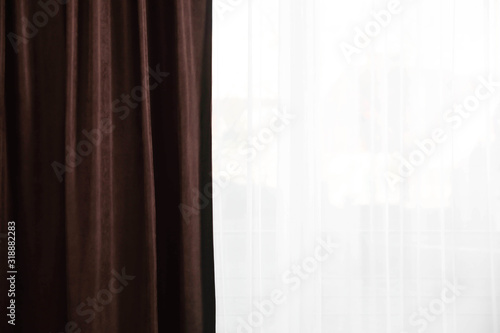 Window with elegant curtains indoors  closeup view