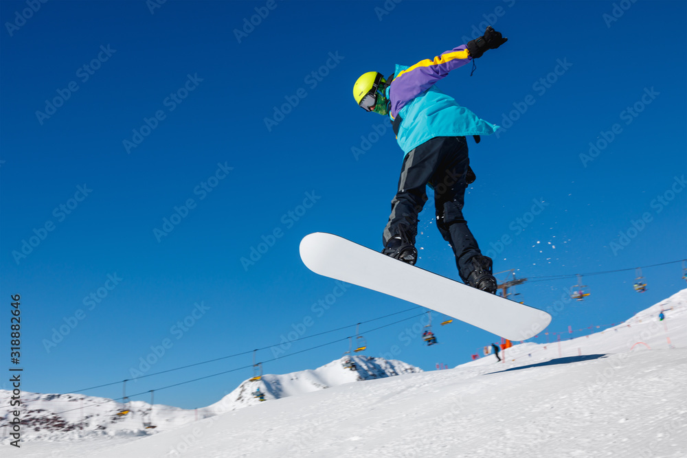Snowboarder and a blue sky