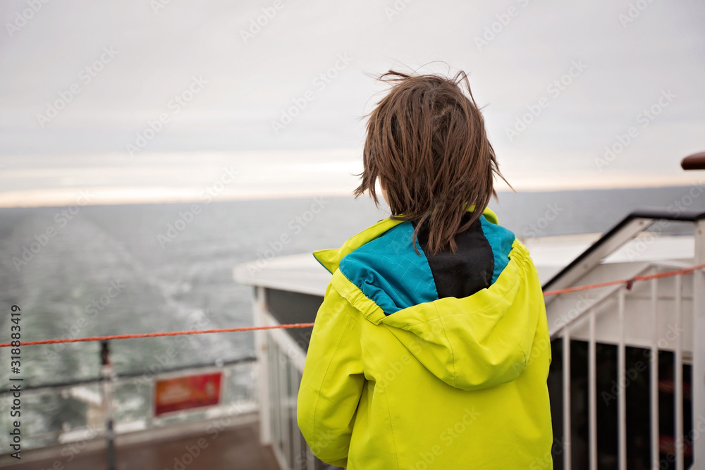 Fototapeta premium Children, playing on a ferry boat while traveling