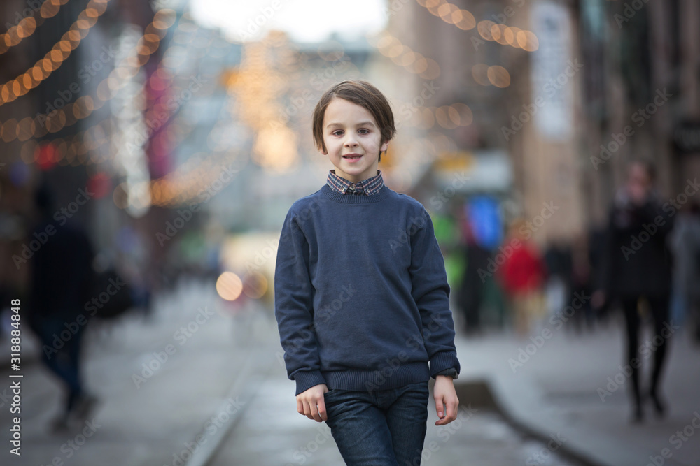 Fototapeta premium Sweet school child, walking on a street in Helsinky