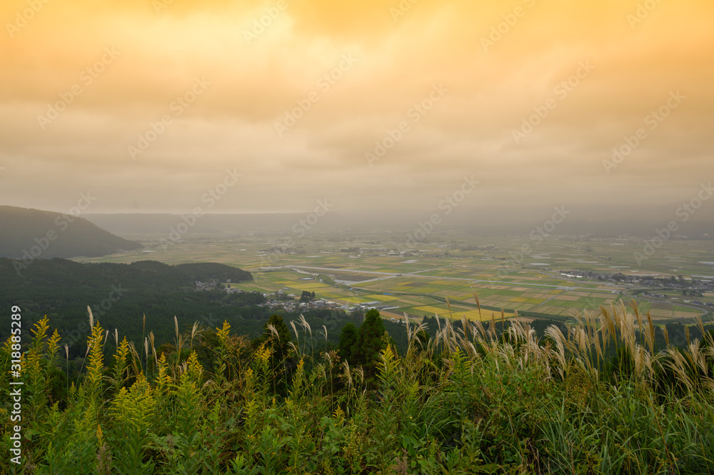 Obraz premium Spacious rural scenery on top of the mountain in Aso Japan.Viewpoint of Aso in japan.